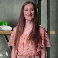 Joanne Ebner Smiling woman with long, dark blonde hair